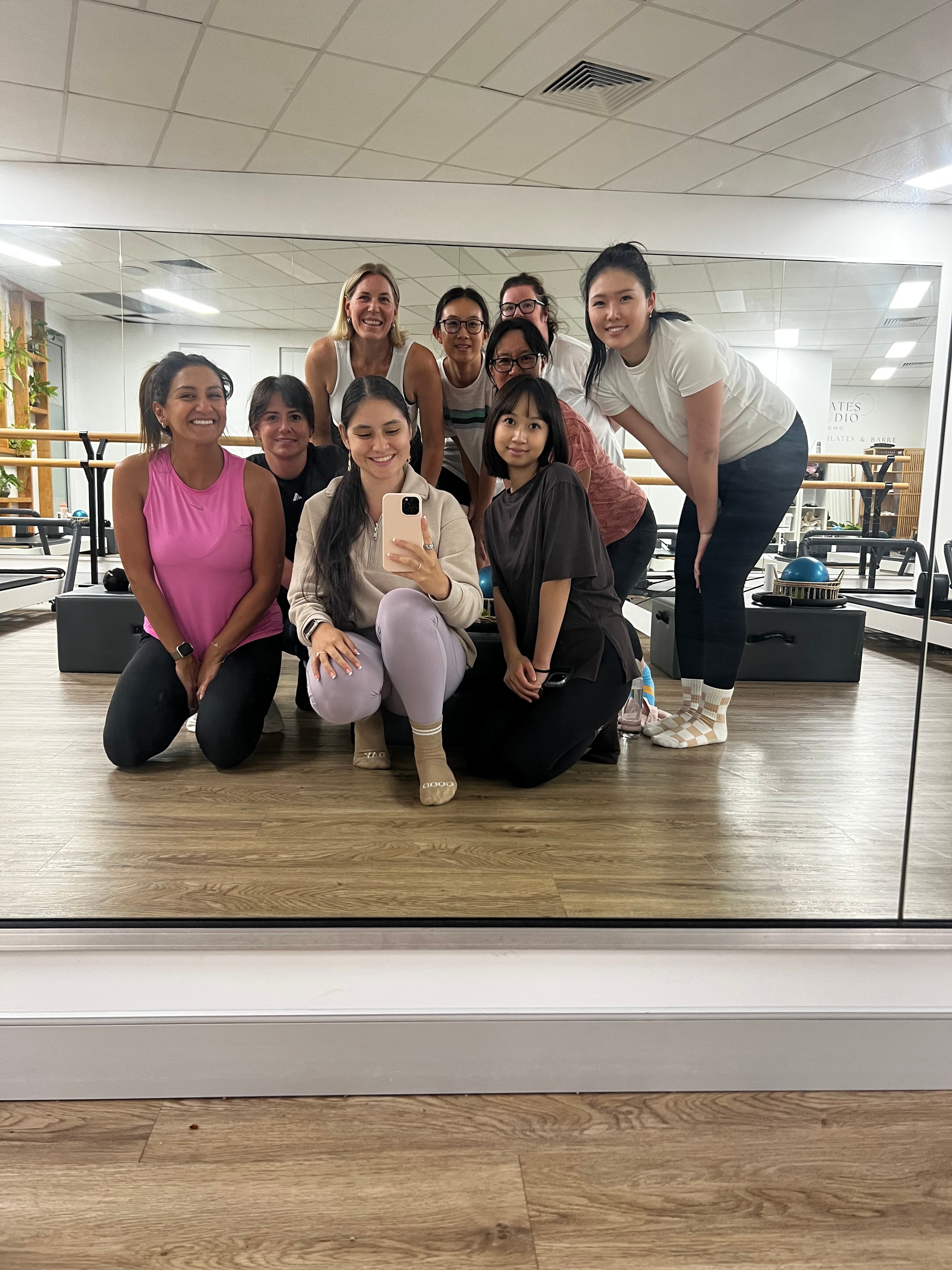 Women in a mindful movement mat pilates class